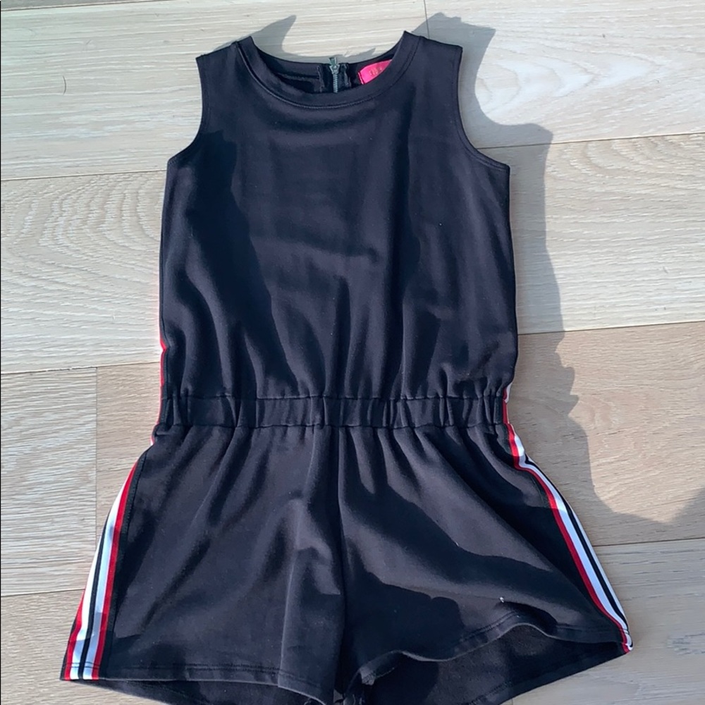 Black romper with red and white stripes